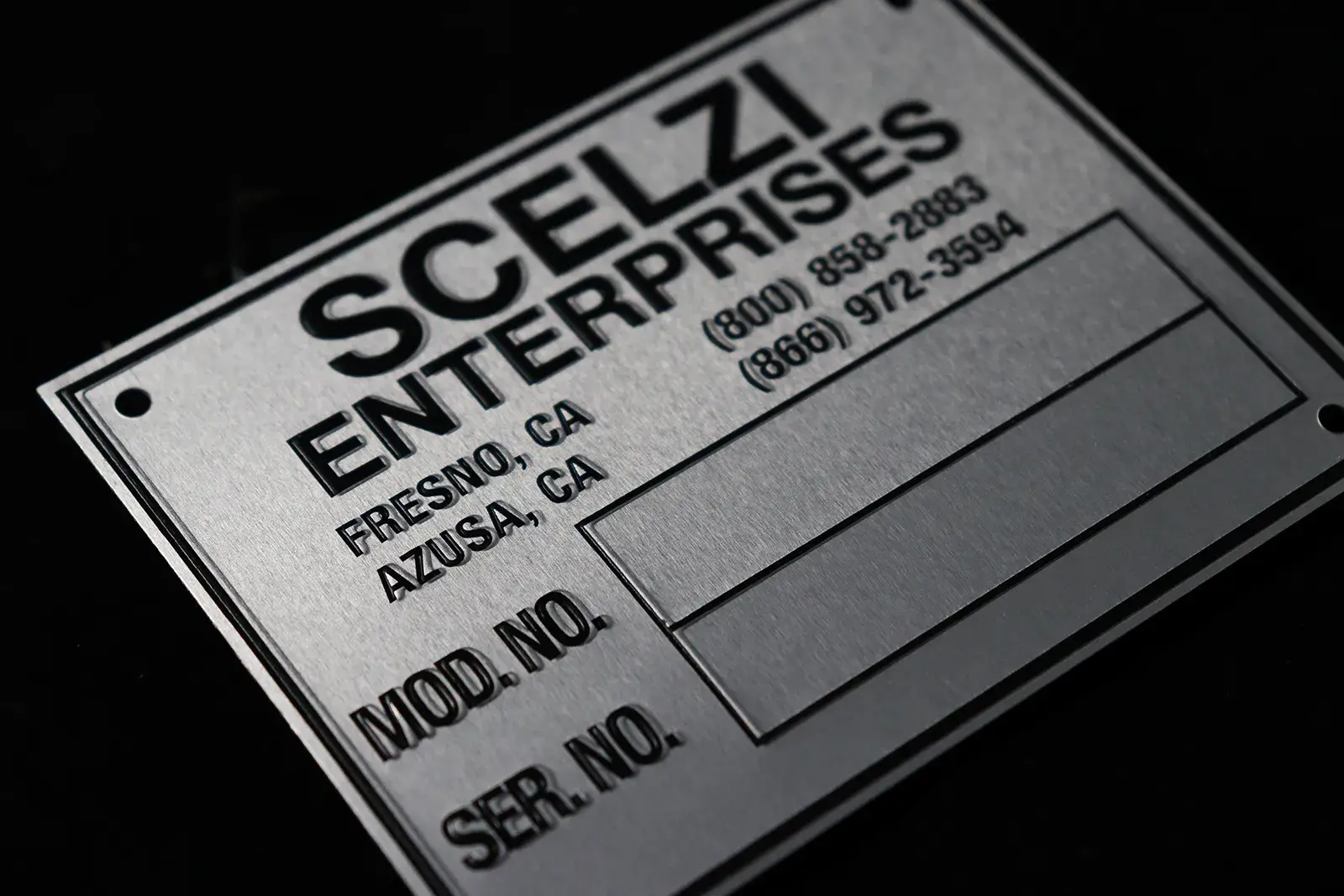 Embossed aluminum ID plate with model and serial number fields